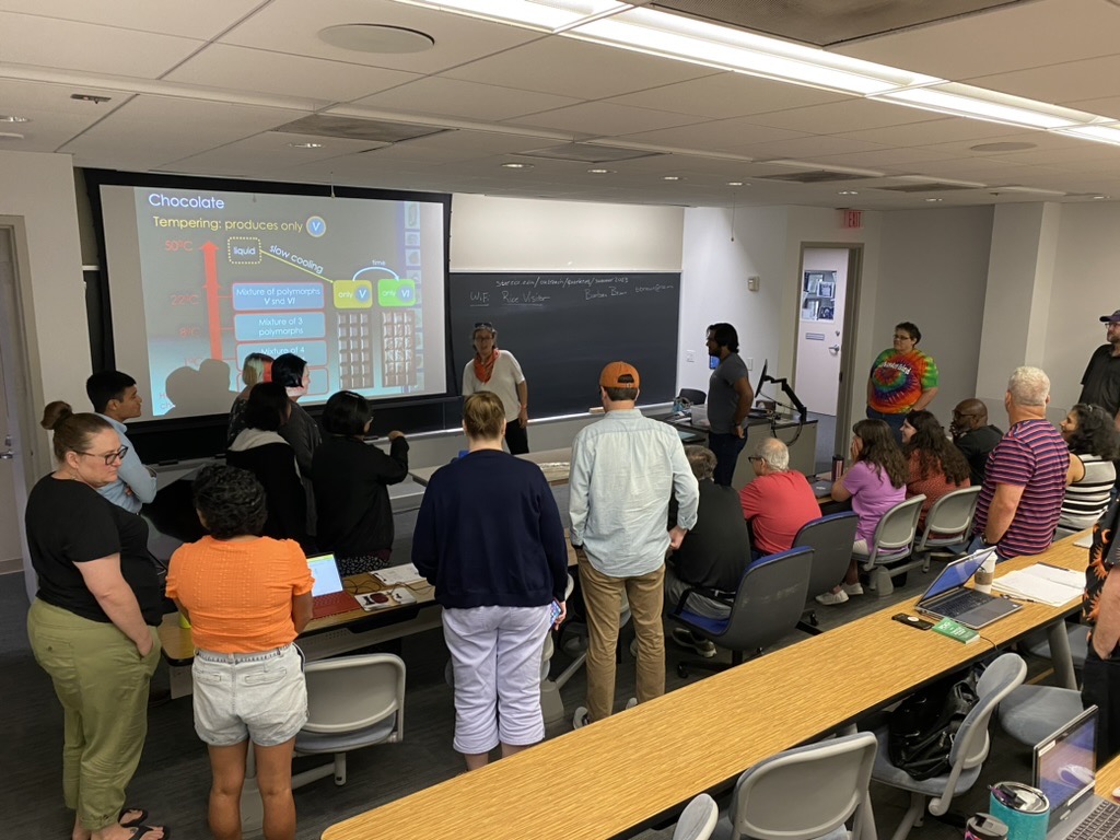 Tuesday lecture: Teachers gathered around Prof. Morosan's (Rice) who demonstrates supercondictivity